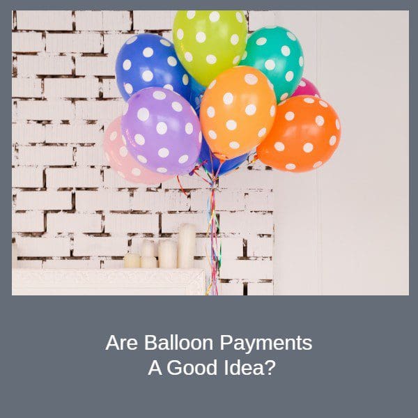 This is an image of coloured balloons against a light coloured brick wall for blog post Are Balloon Payments A Good Idea